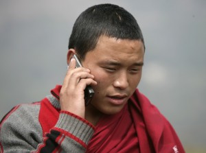 Bhutanese Monk on a Cell Phone