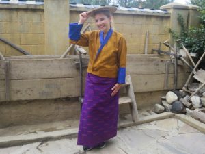 Dr. Martina tries out the Bhutanese attire
