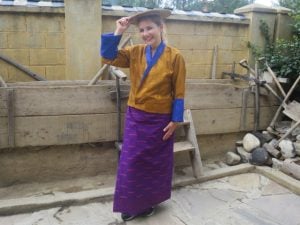 Dr. Martina tries out the Bhutanese attire